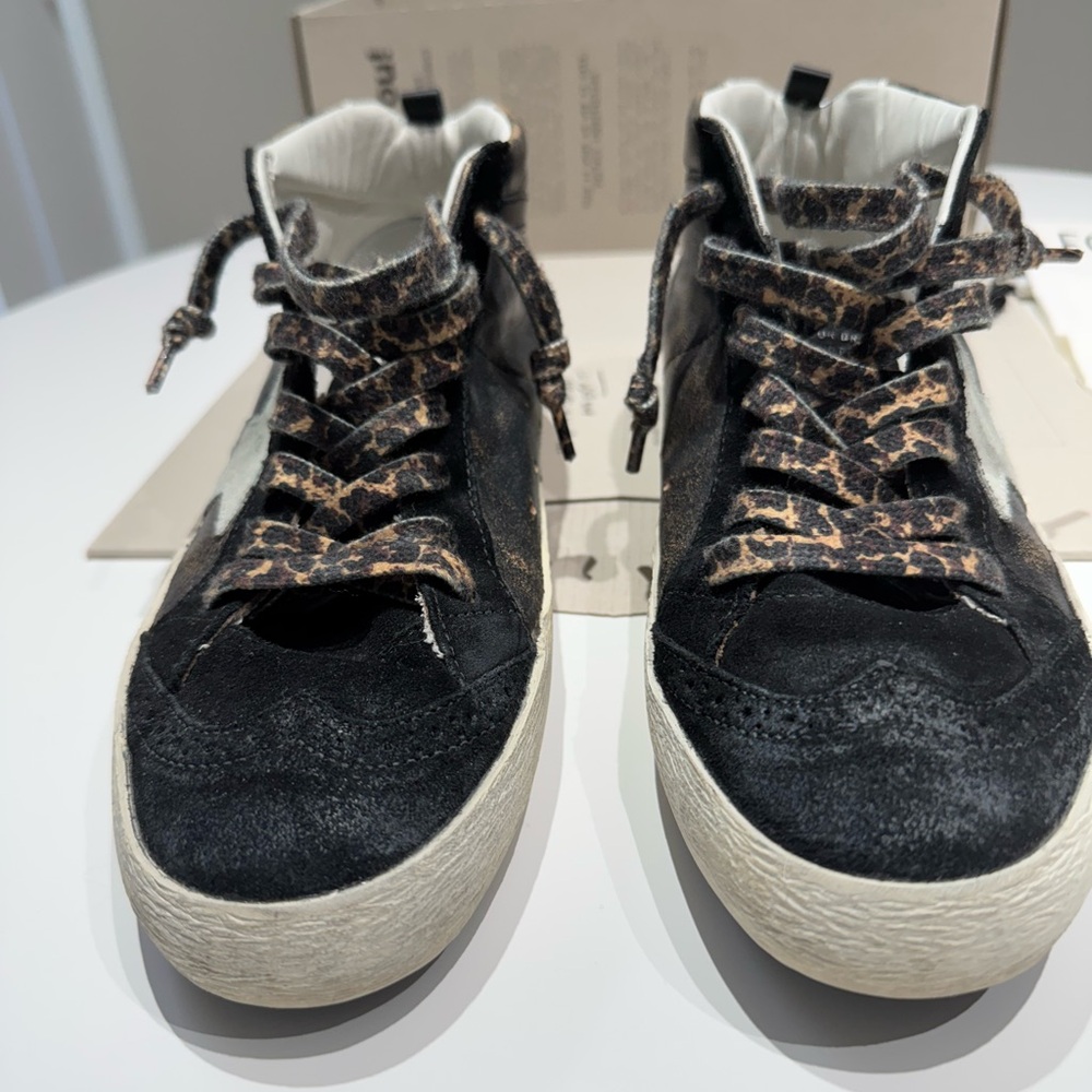 Golden Goose mid top Sneakers with Leopard Print Laces.